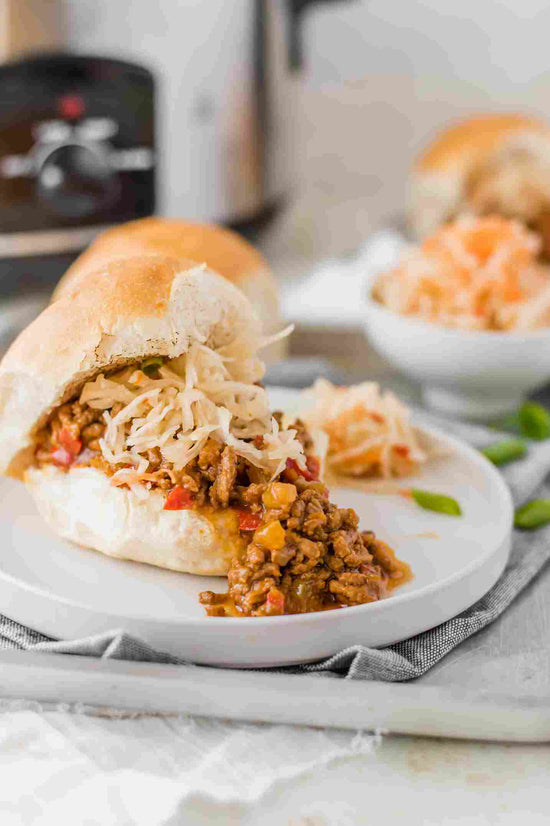 A white plate of Sloppy Joes.