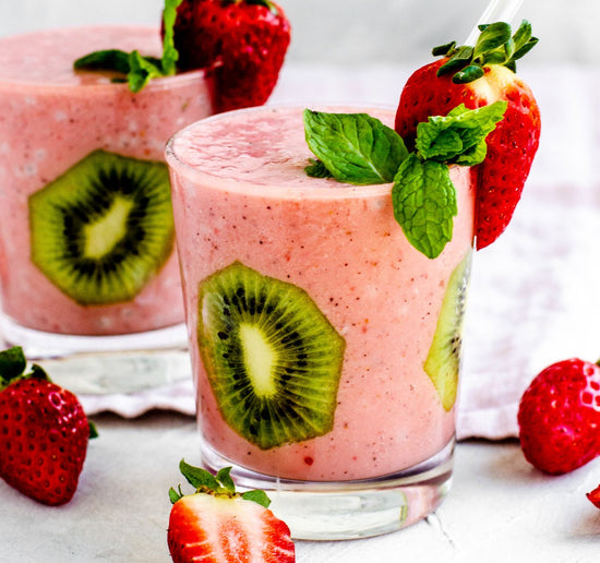 Two glasses of strawberry and kiwi smoothie.