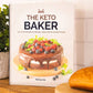 The Keto Baker cookbook leans against a white tile wall. A flower pot and bread can be seen on the wooden plain surface.